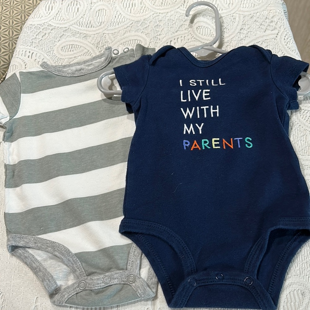Baby Onesies 3-6 Months .Total of 4 Pieces different Patterns.4 pieces for 5$